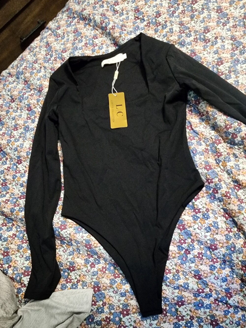 Black Long-Sleeve Women Bodysuit - V-Neck One-Piece